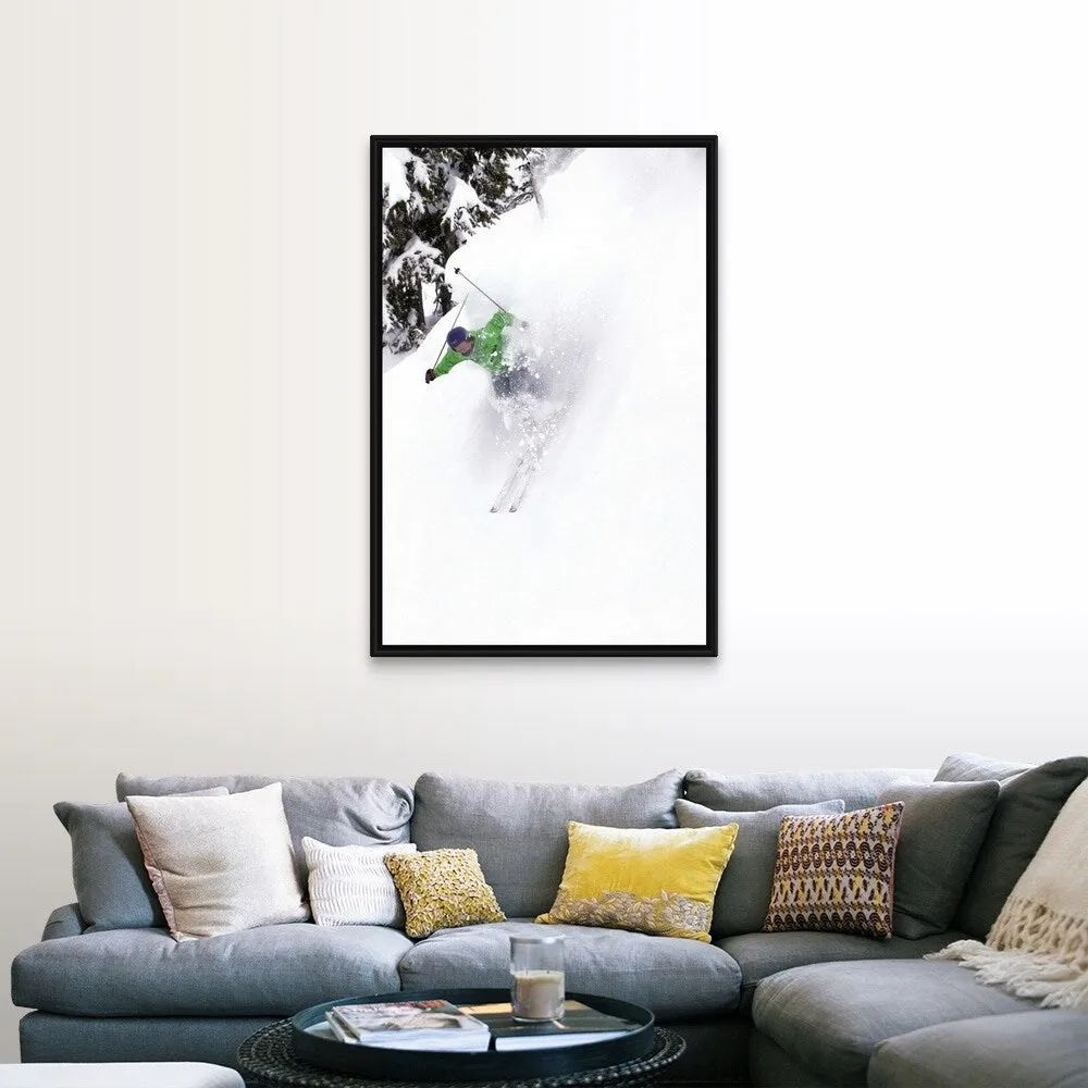 "A free skier skis down a steep hill near trees, kicking up snow." Black Float Frame Canvas Art