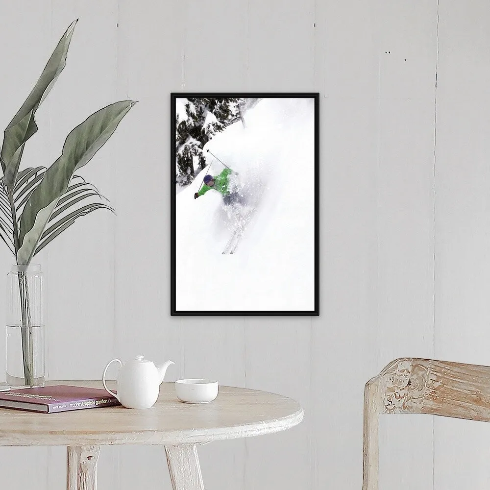 "A free skier skis down a steep hill near trees, kicking up snow." Black Float Frame Canvas Art