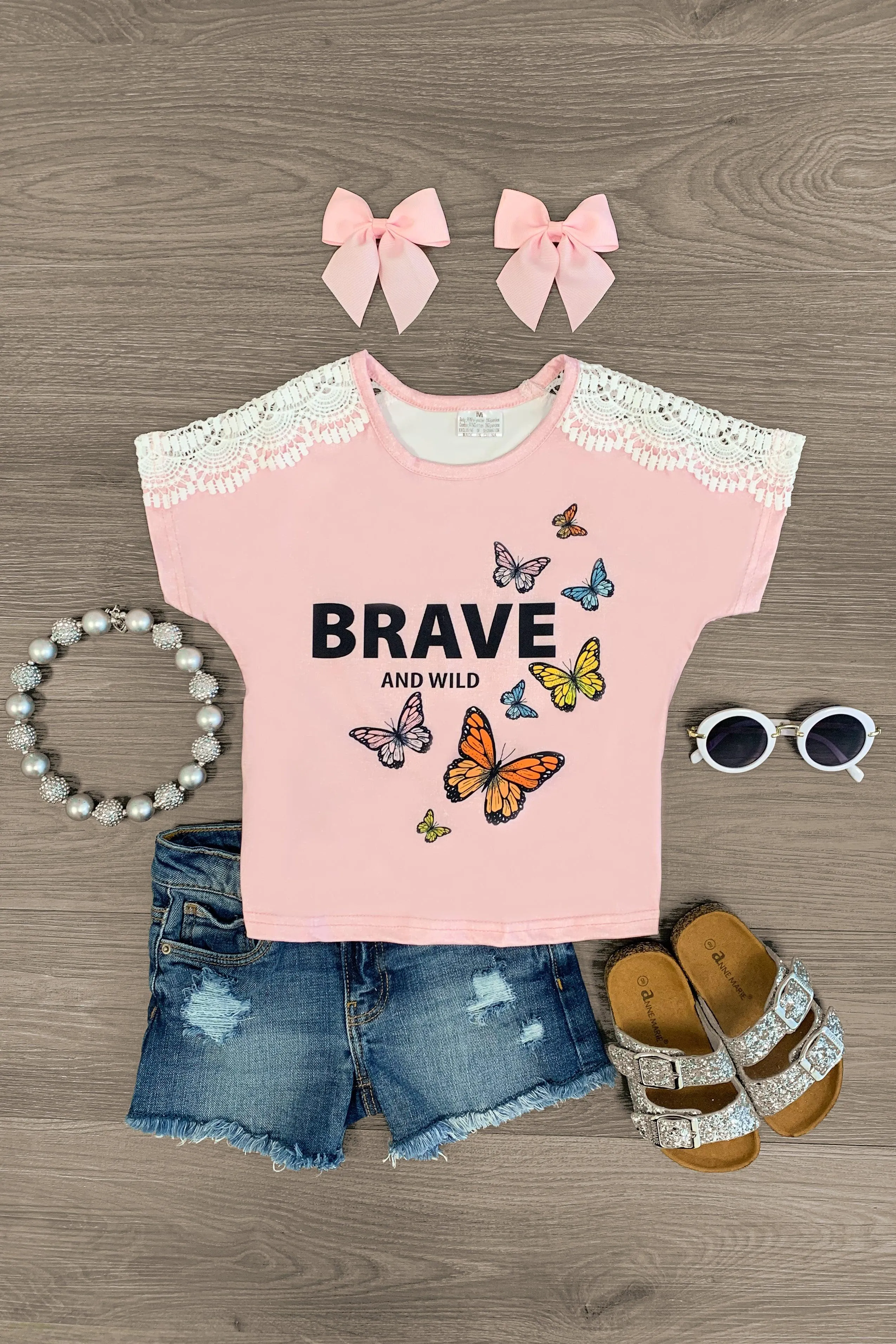 "Brave & Wild" Pink Butterfly Top